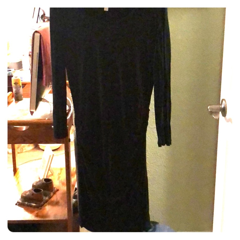 Black dress with gathers.